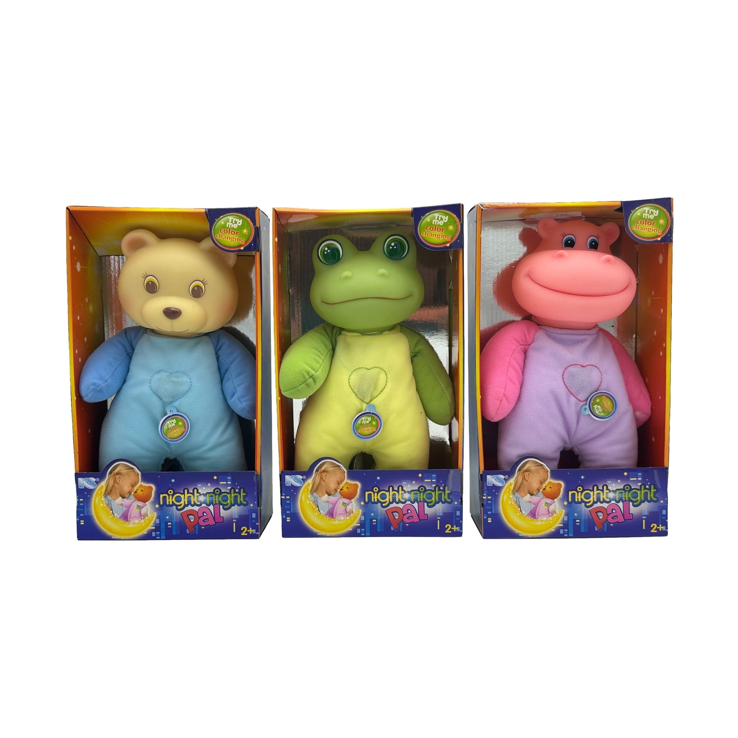 Three boxed "Night Night Pal" stuffed animals: a yellow bear, a green frog, and a pink hippo.